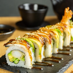 sushi on brown wooden tray