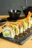 sushi on brown wooden tray