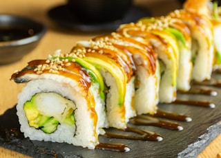 sushi on brown wooden tray