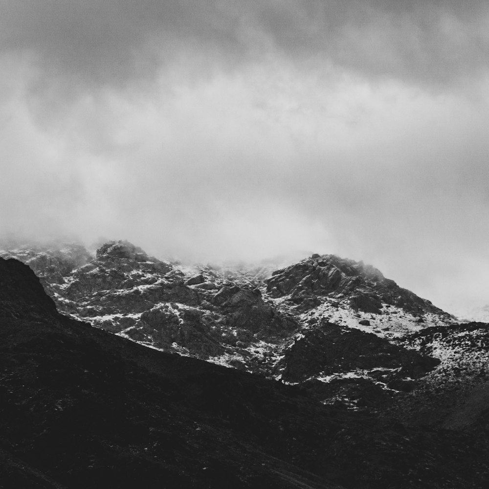 grayscale photo of snow covered mountain