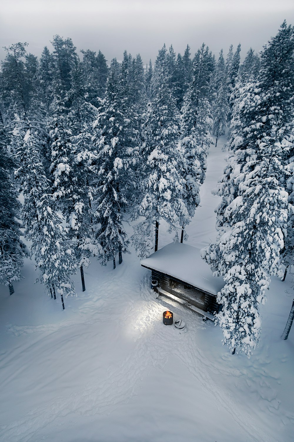 black car on snow covered road during daytime