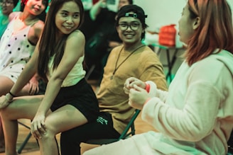 A vibrant image of people chatting happily.