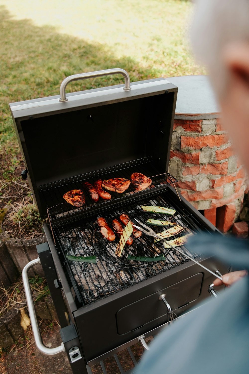 grilled meat on black outdoor grill