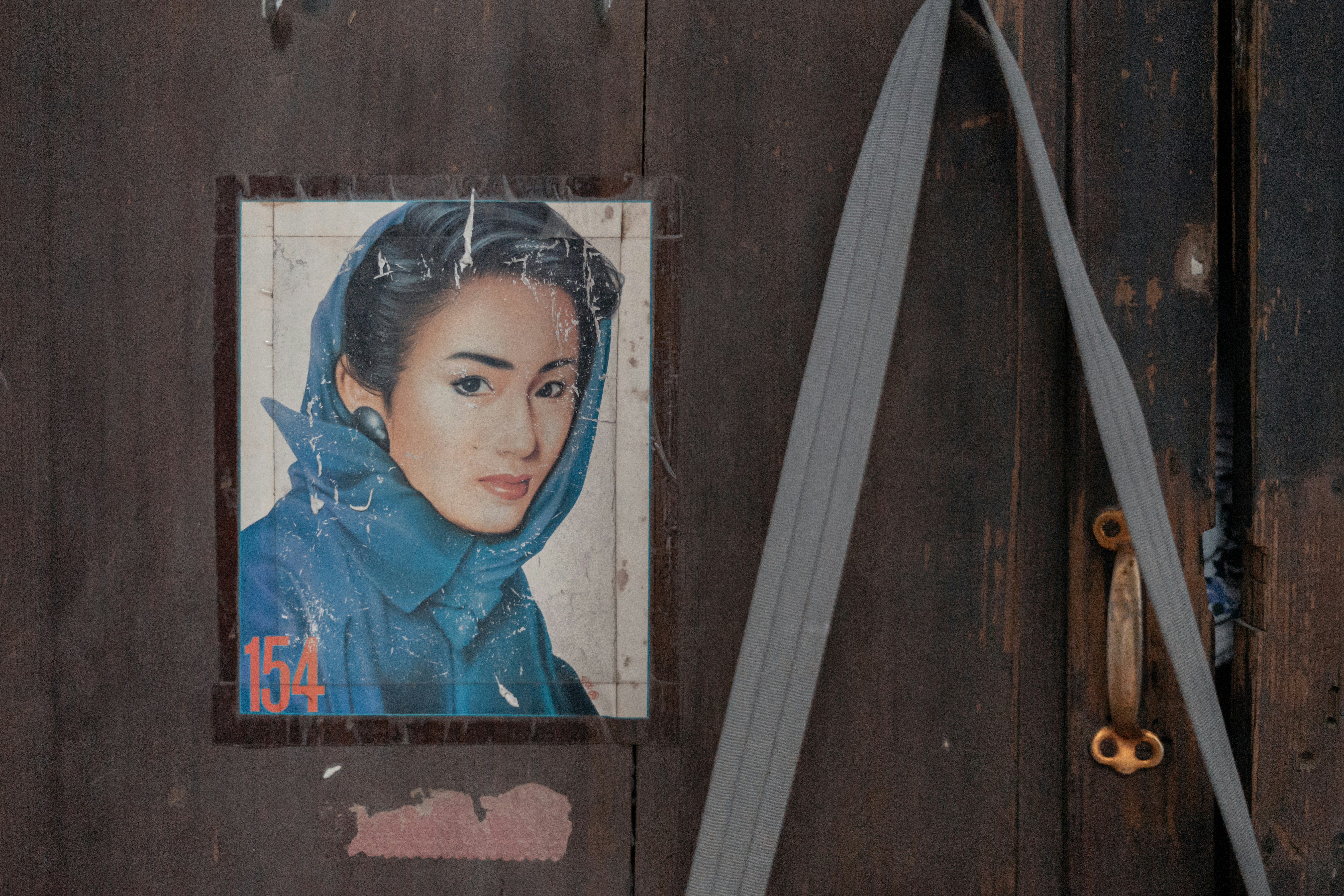 girl in blue and white floral hijab