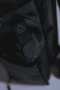 A close-up of the reinforced stitching on a backpack.