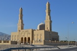 beige concrete building under blue sky during daytime