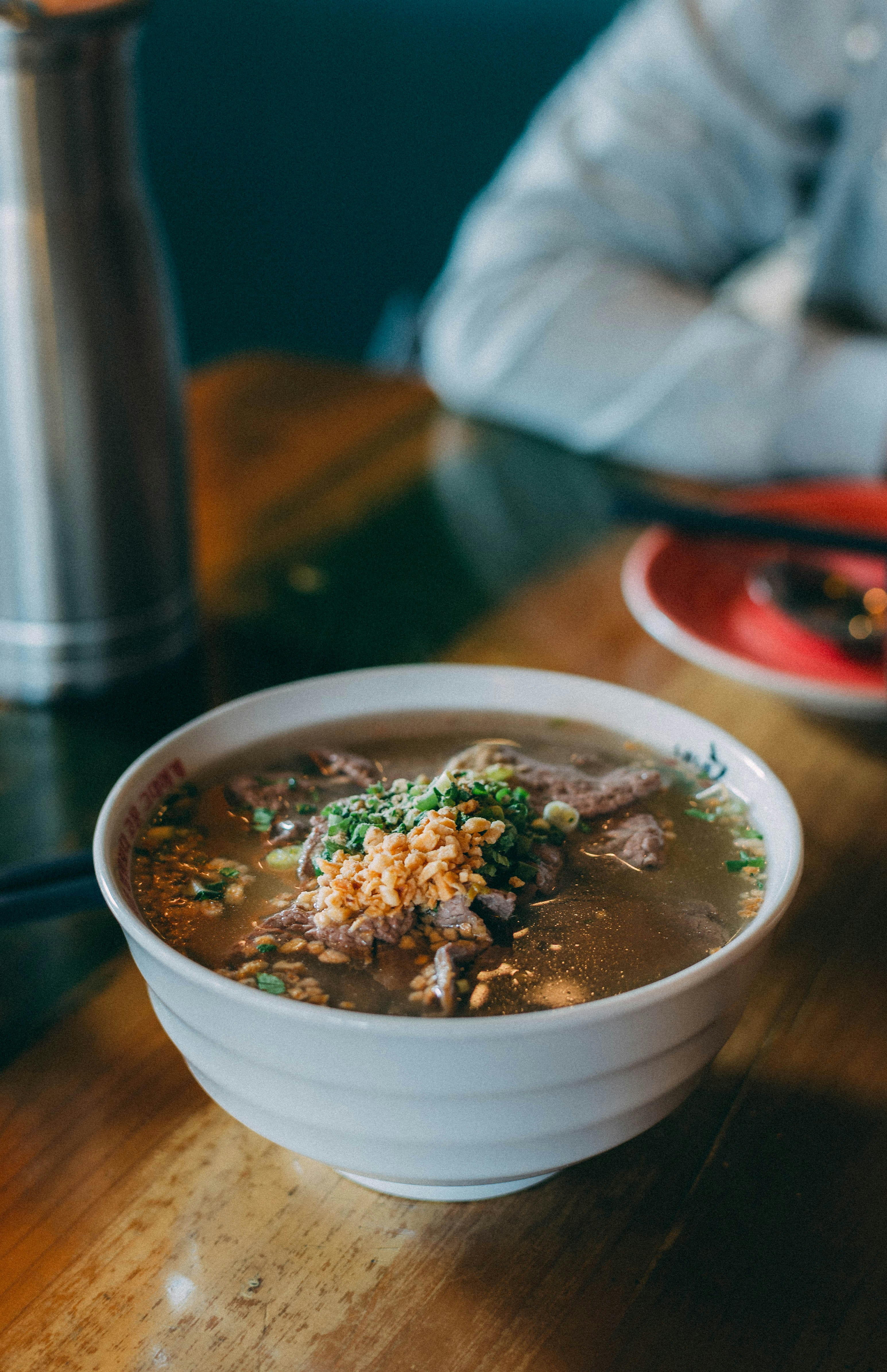 white ceramic bowl with soup