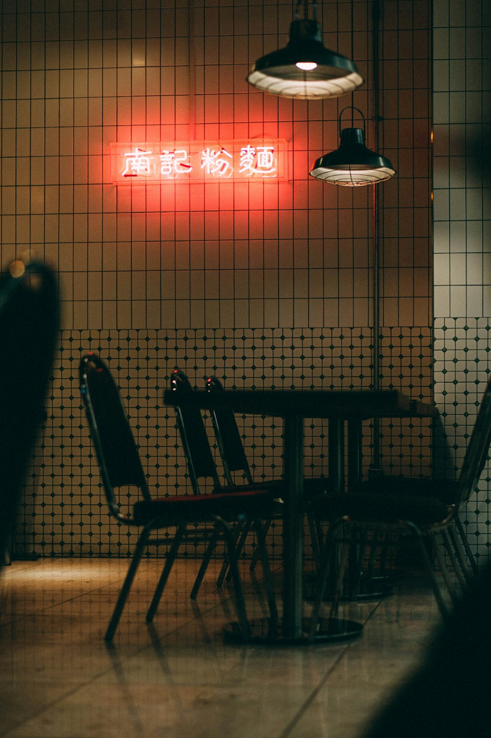 black wooden chairs and table