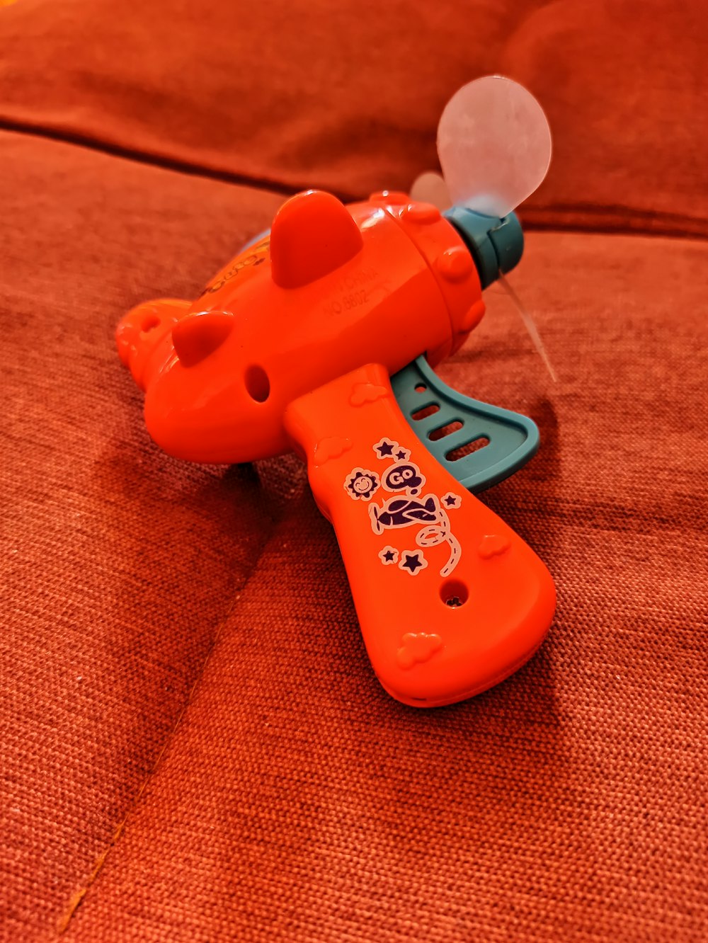 orange and white plastic toy