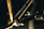 Close-up of BMX bike parts with a vibrant urban background.