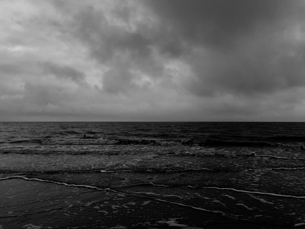 grayscale photo of ocean waves