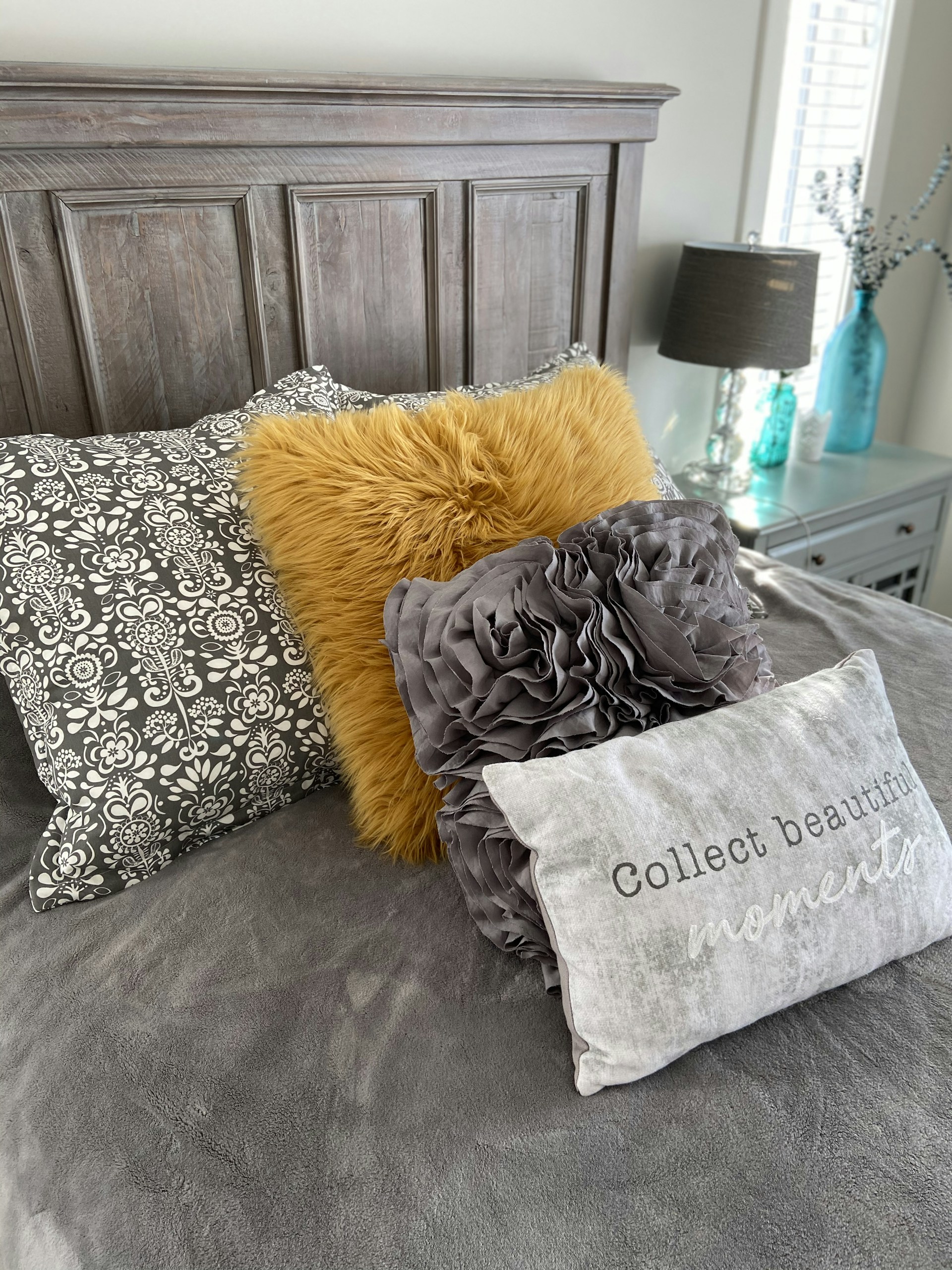 gray and white throw pillows on orange throw pillow