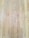 A close-up view of wooden floorboards, showing a natural wood grain pattern with varying shades of light brown and beige. The floorboards are aligned in parallel rows, exhibiting a smooth and polished surface.
