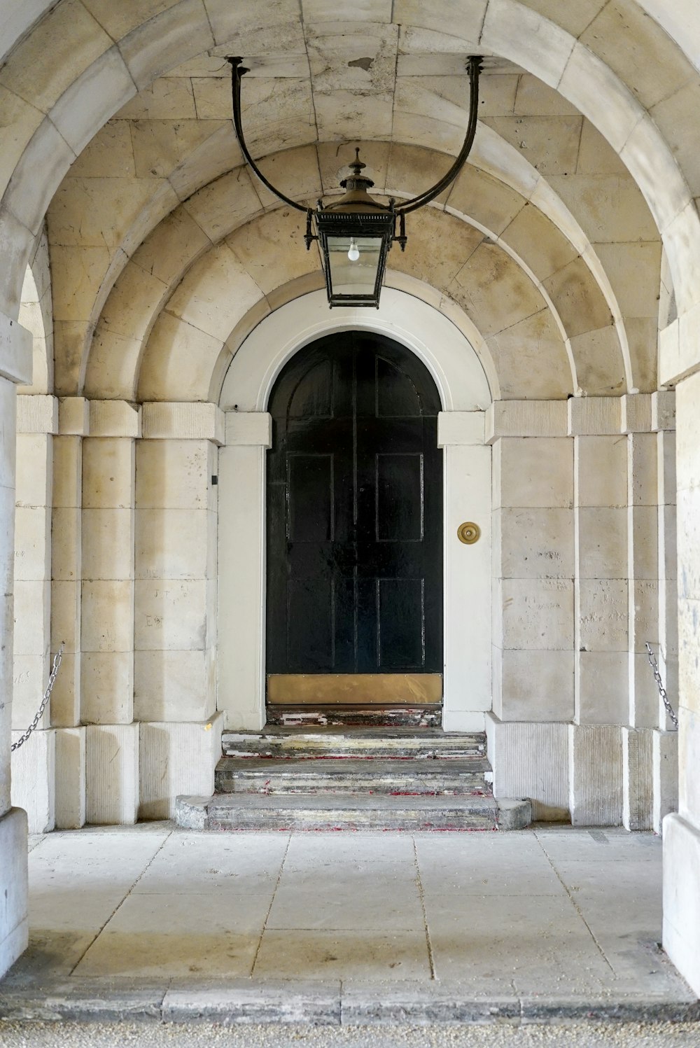 brown wooden door on brown concrete building