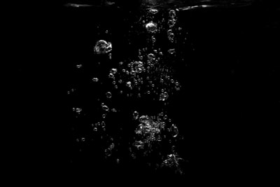 water droplets on black and white