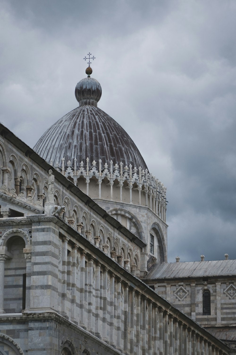 white and gray dome building under cloudy sky during daytime