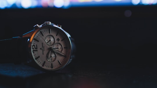 Modern electronic watches and stylish sunglasses showcased with bright backgrounds.