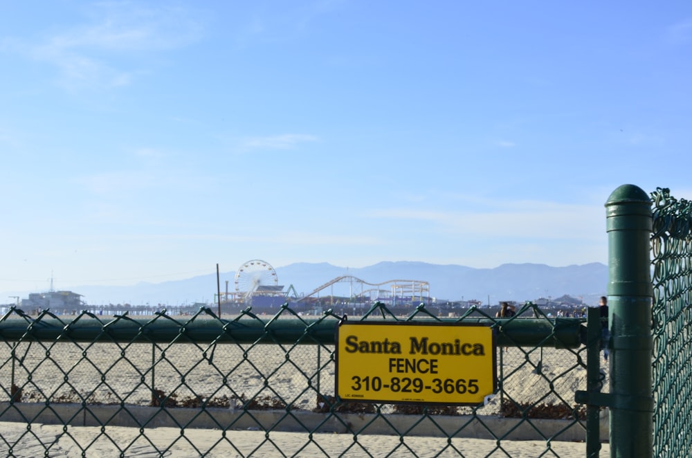 black metal fence with yellow and black UNK UNK UNK