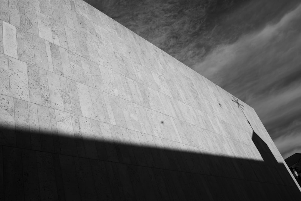 grayscale photo of concrete wall