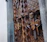 A beautifully crafted wooden door with intricate carvings in a modern home setting.