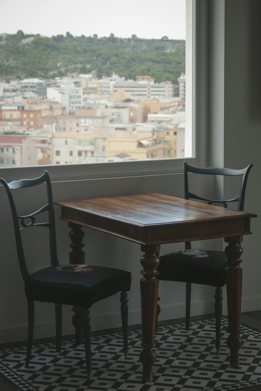 brown wooden table and chairs