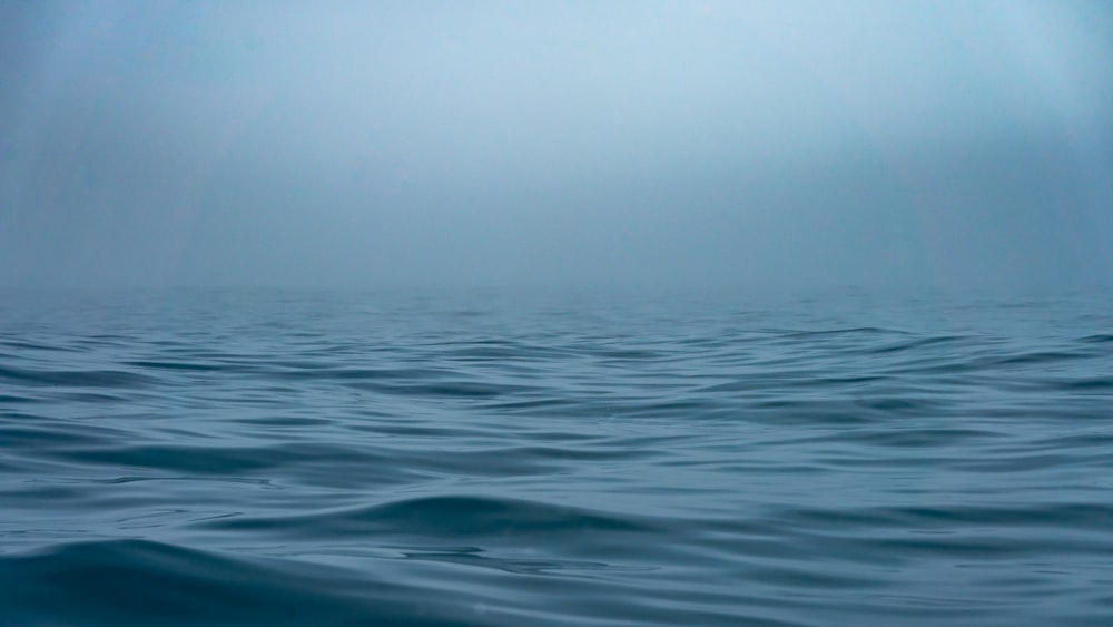 blue sea under blue sky during daytime