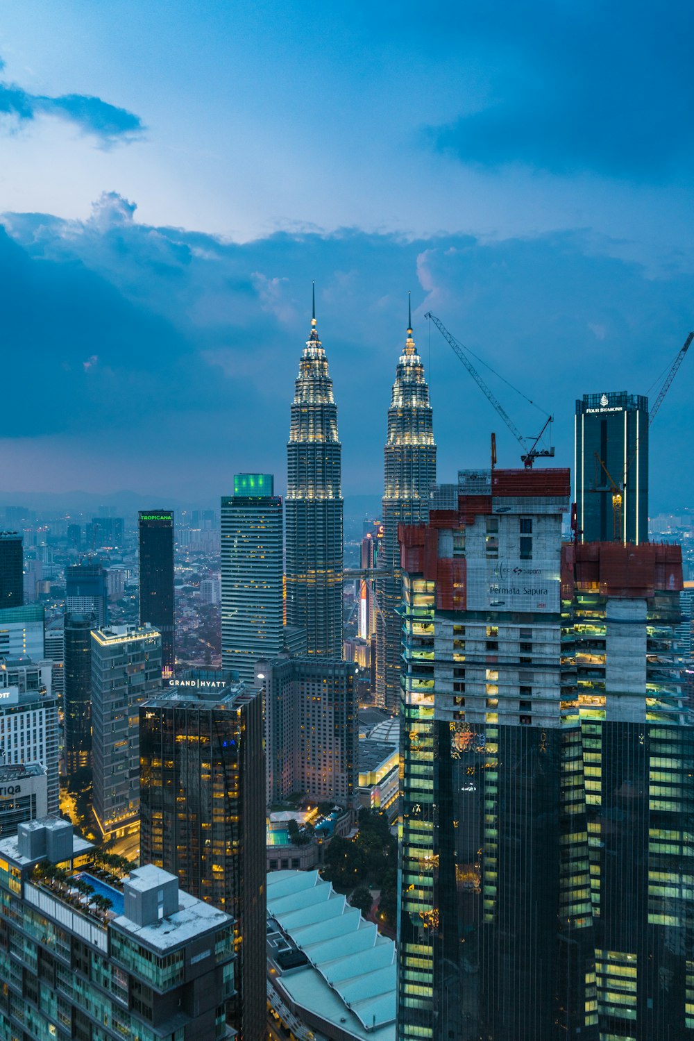 high rise buildings under blue sky during daytime