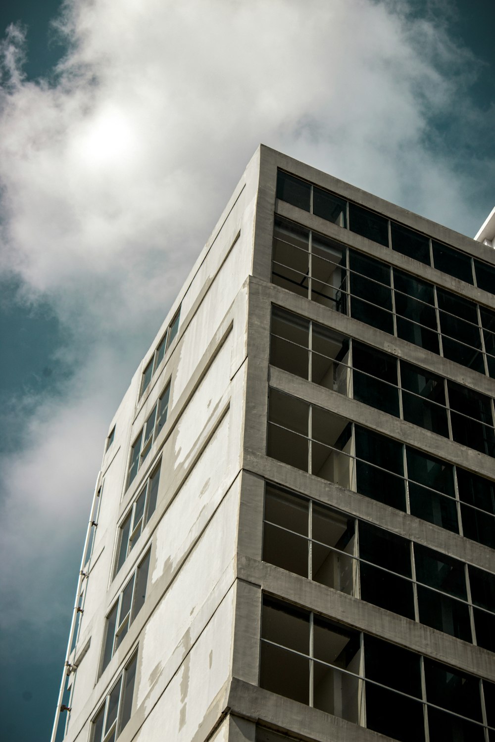 white concrete building under blue sky during daytime