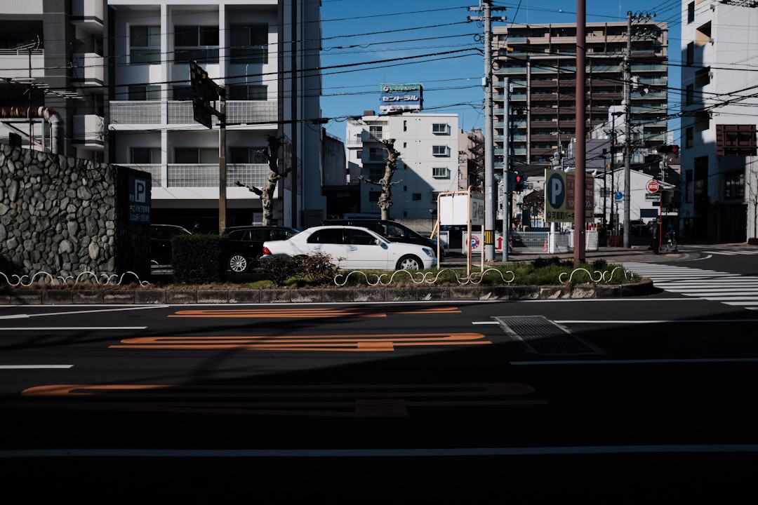 white car on road during daytime