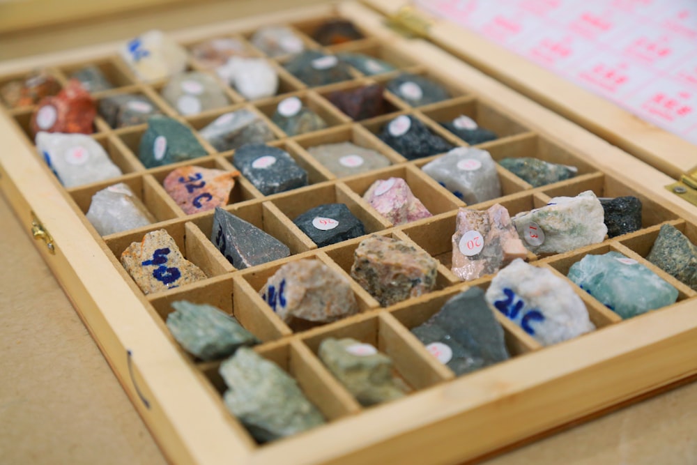 blue and brown stone on brown wooden box