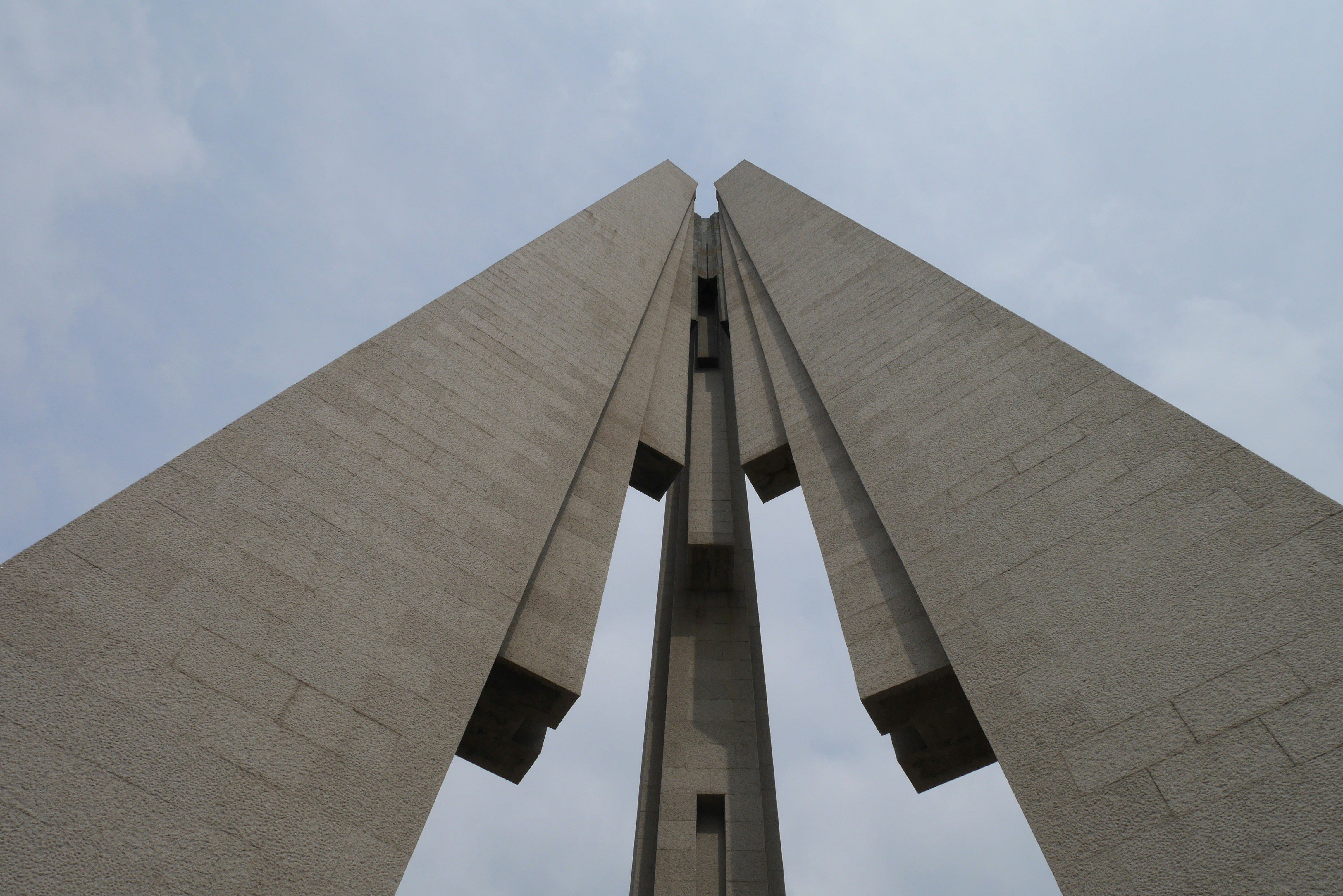 brown concrete building under blue sky during daytime