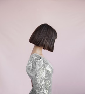 A trendy bob haircut with a sleek finish.