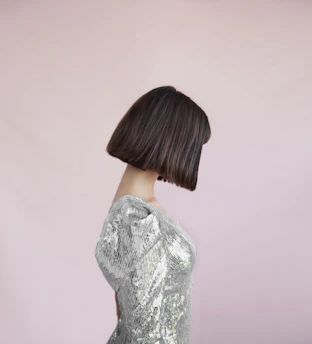 Elegant woman with a flawless bob hairstyle, smiling gently