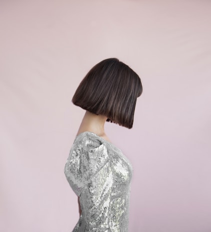 A sleek, modern bob haircut with smooth, shiny hair reflecting the studio’s attention to detail.