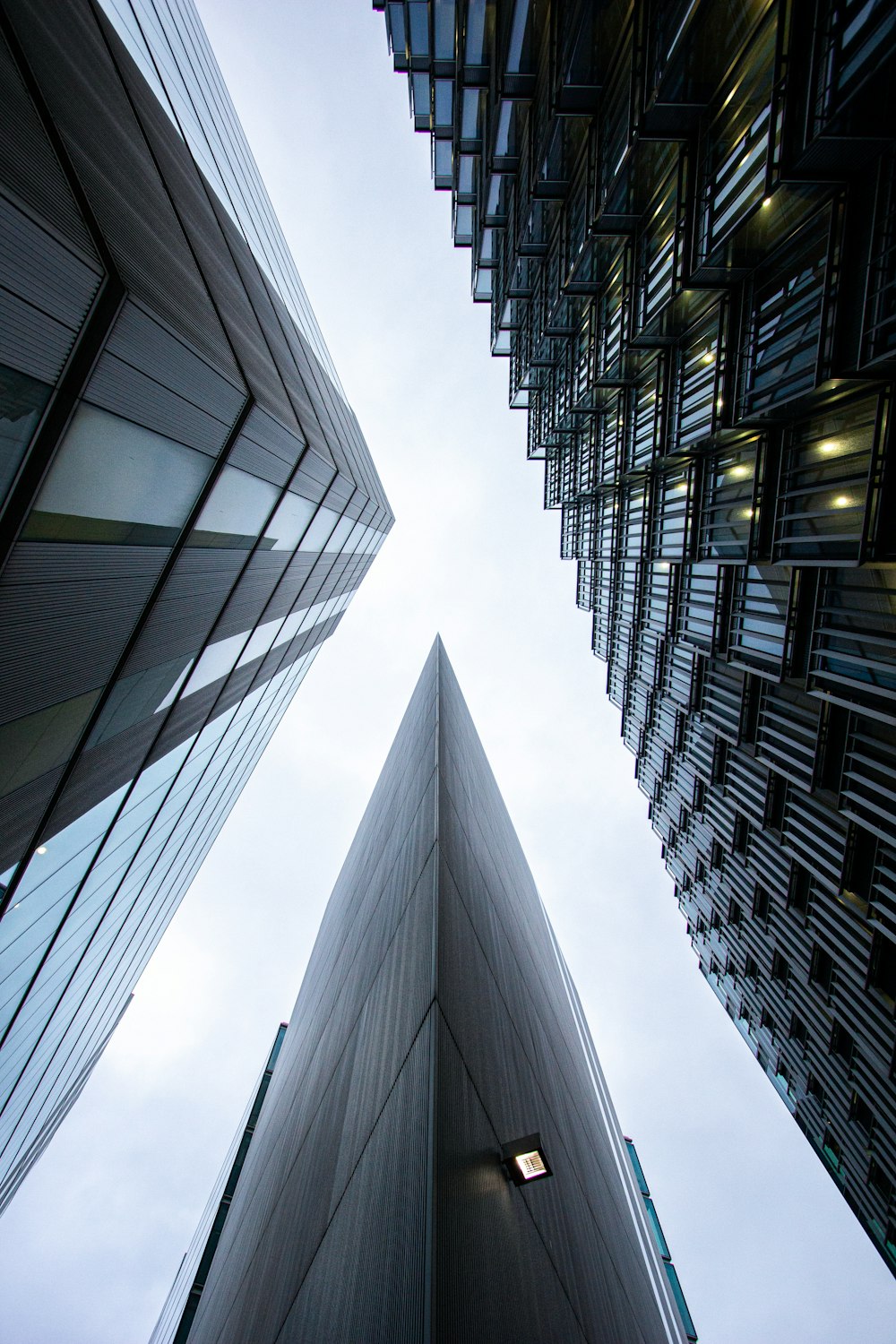 low angle photography of high rise buildings