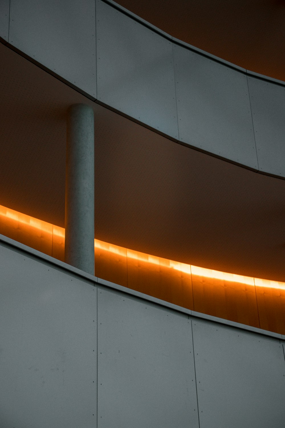 white concrete staircase with gray metal railings