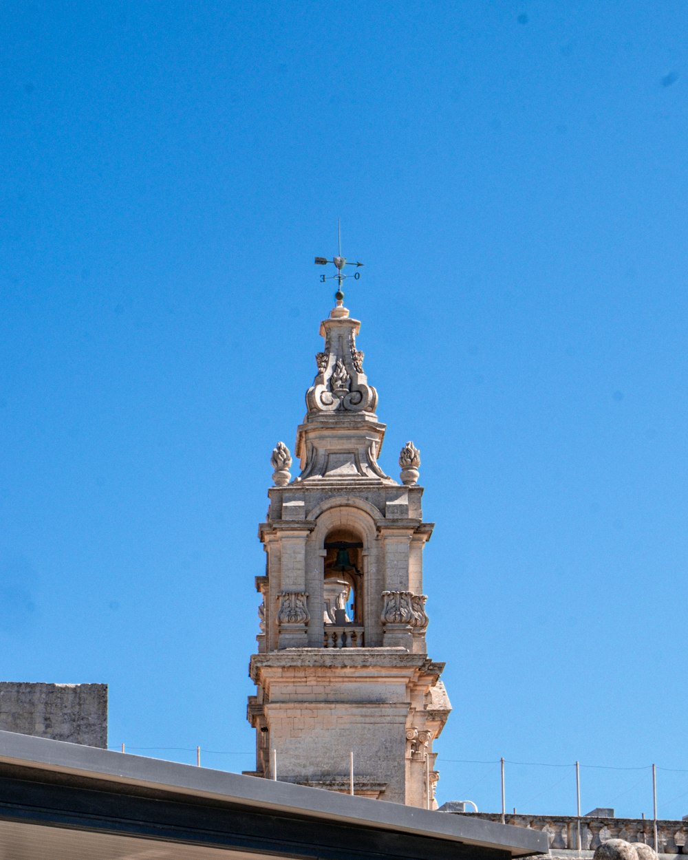 brown concrete building under blue sky during daytime