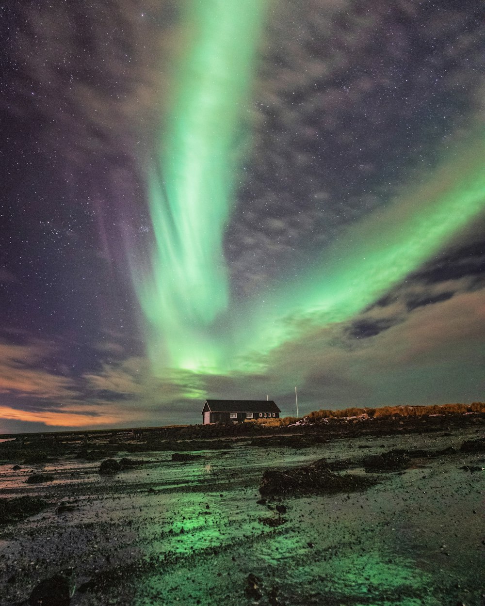 green and blue sky with stars