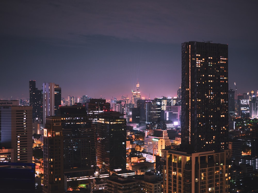 city skyline during night time