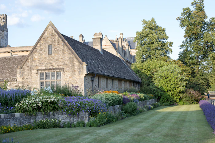 The stone building and its lawn from the garden side