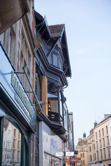 Local Chatham street view with small businesses and a clear blue sky.