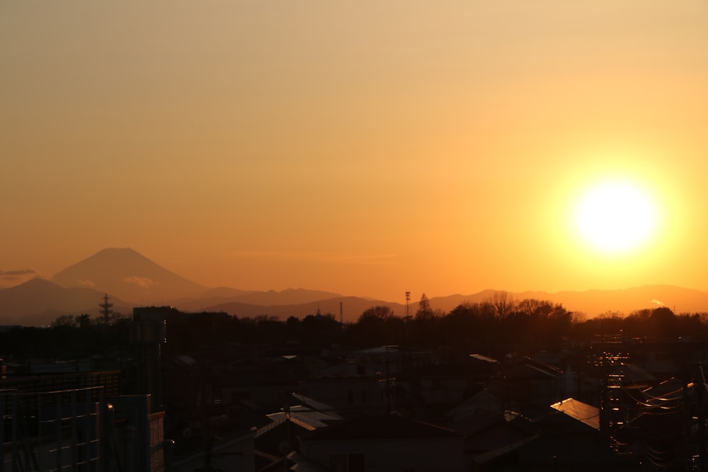 silhouette of buildings during sunset