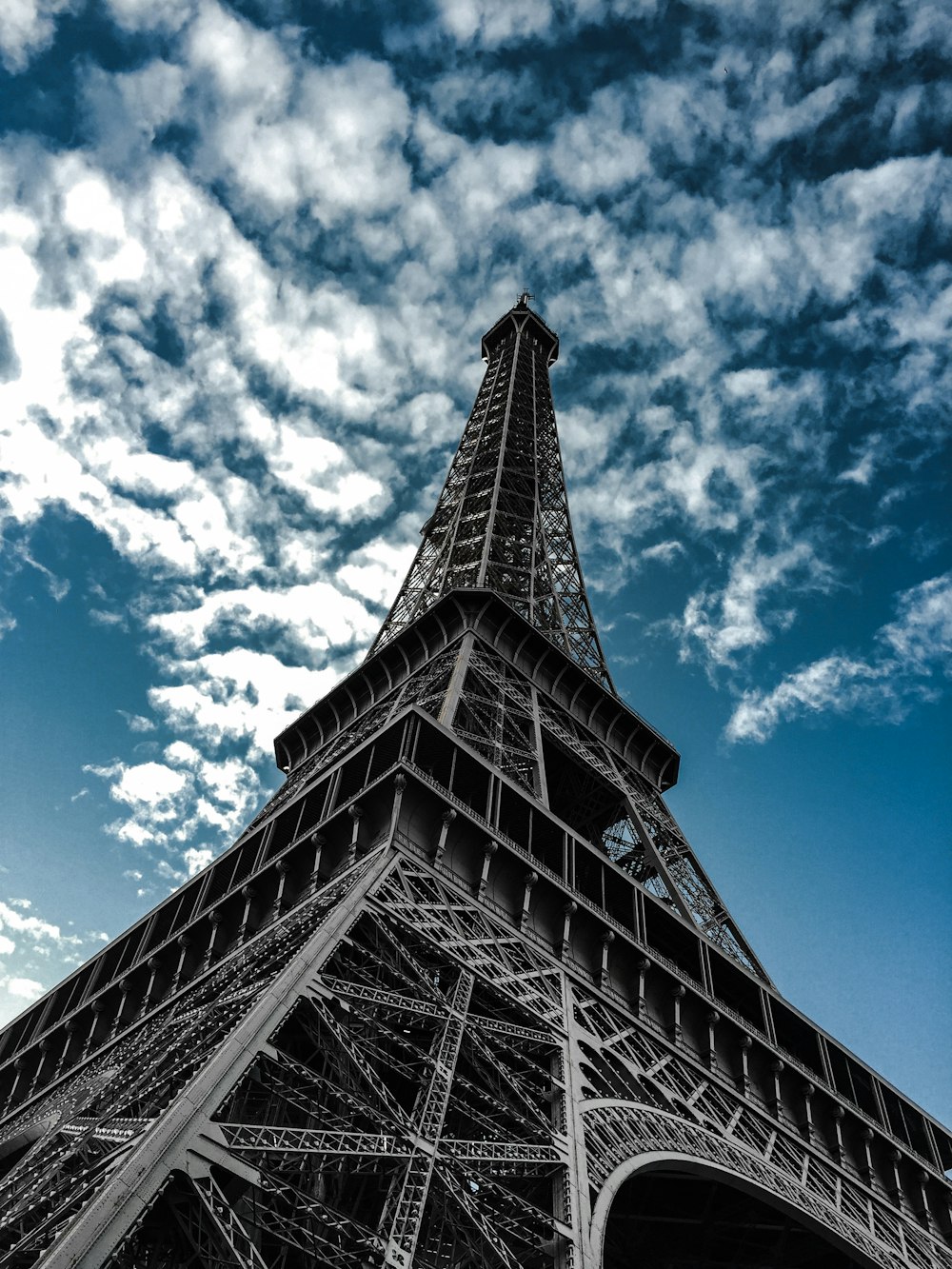 black and white building under blue sky