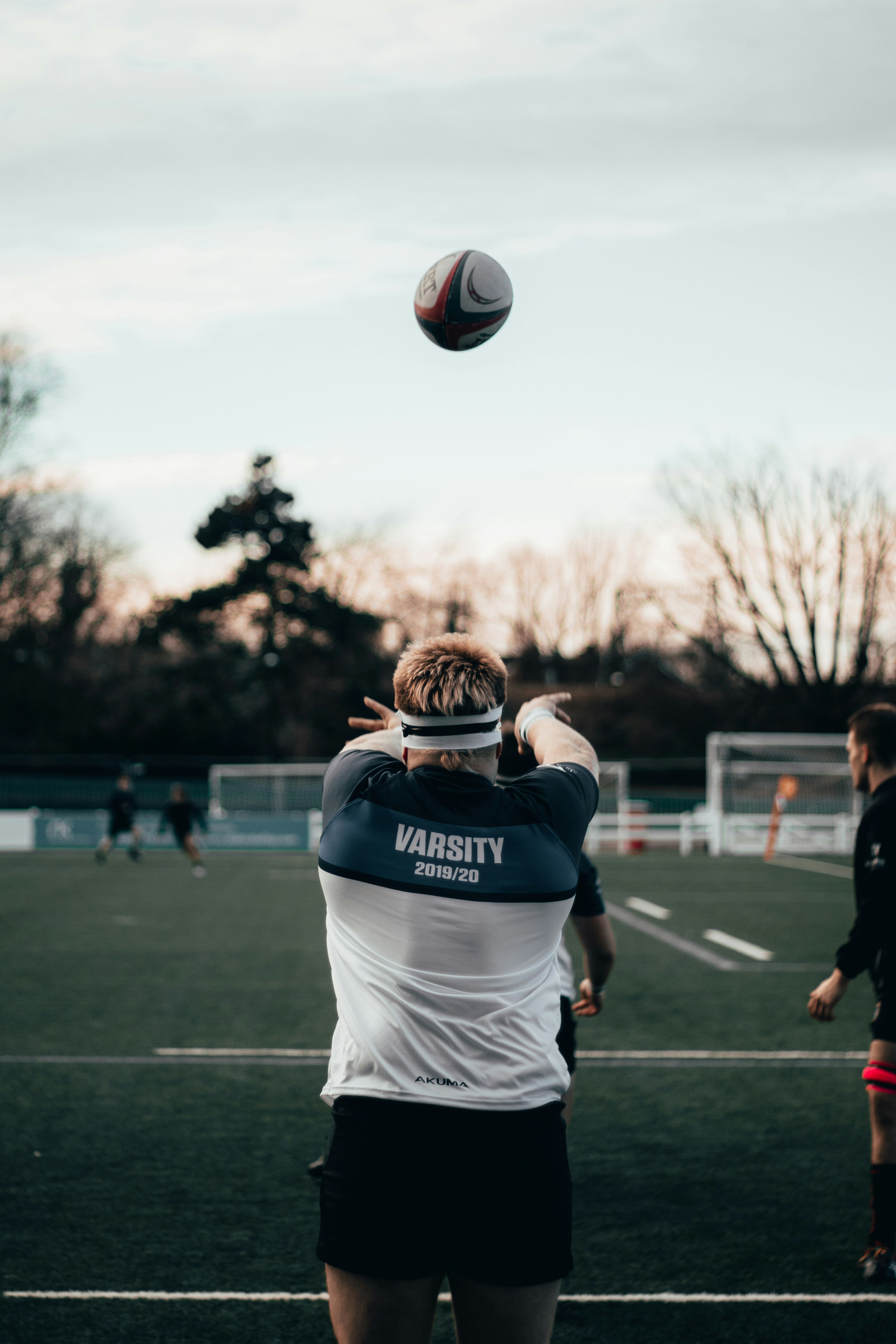 man in blue and white shirt and white shorts playing soccer during daytime  photo – Free Butts park arena Image on Unsplash