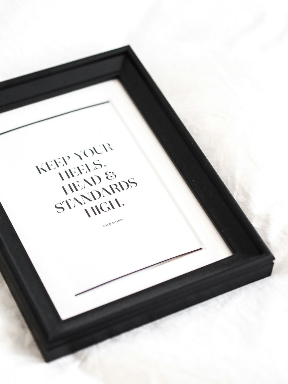 black wooden frame with white text