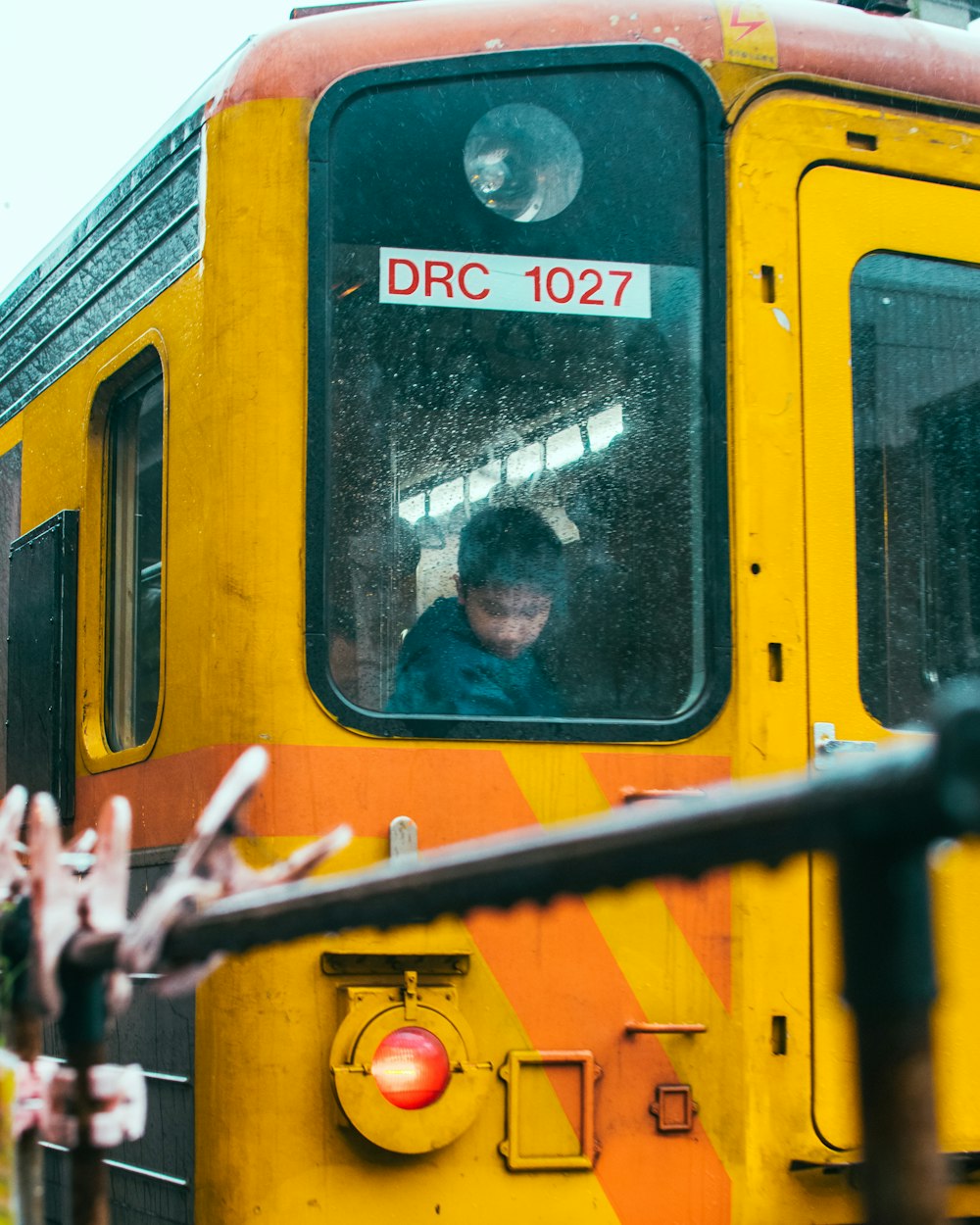 yellow and black train during daytime