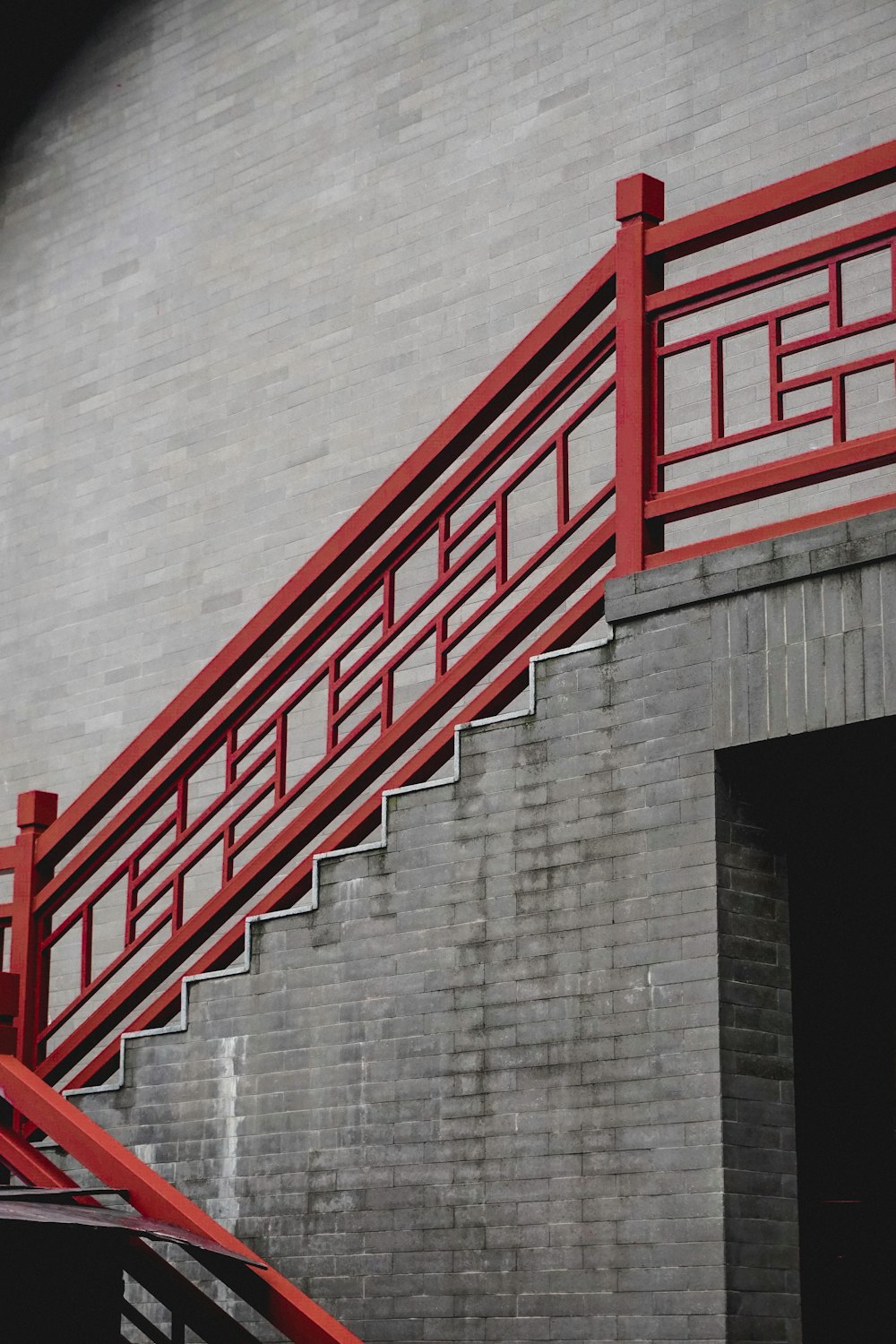 red and gray concrete staircase