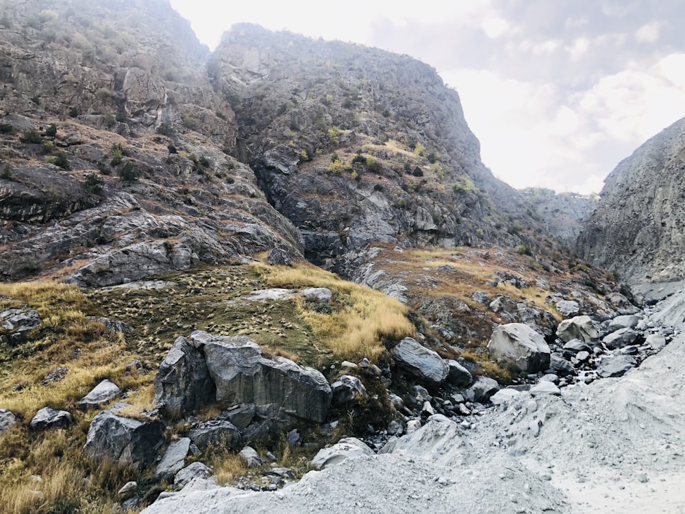 rocky mountain with river during daytime