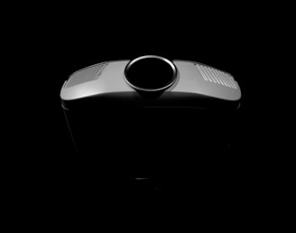 white and black portable speaker