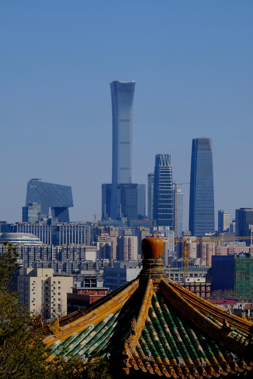 city skyline under blue sky during daytime